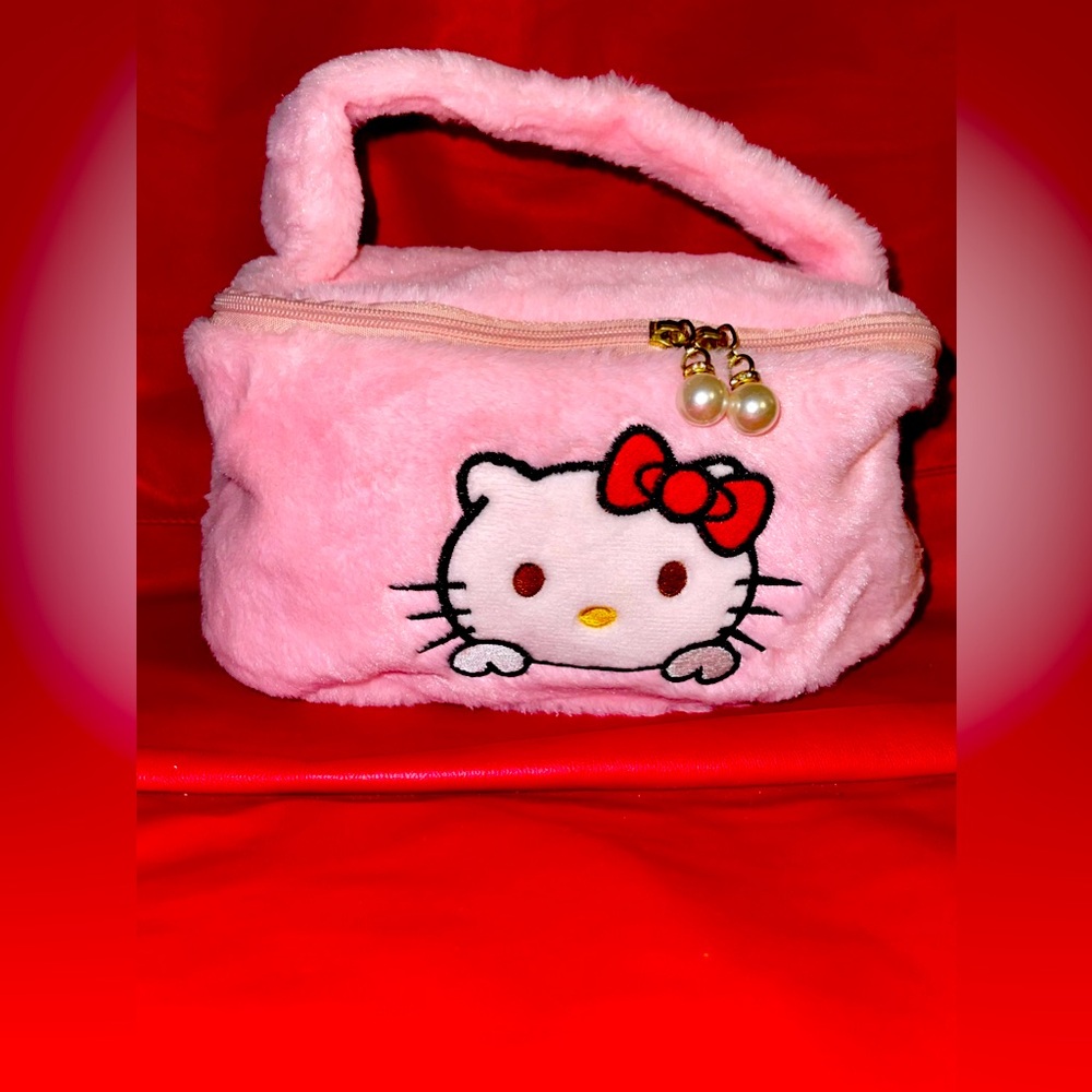 NWOT Sanrio Hello Kitty Pink Plush Mini Makeup Bag.
